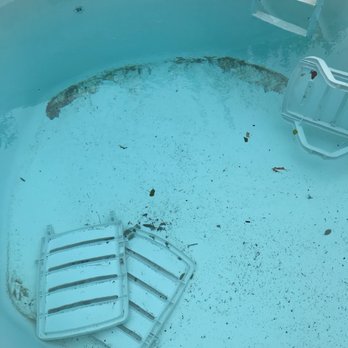 Twiddy - Chairs in the dirty pool when we arrived. - Vacation Rentals Near Me - Duck, North Carolina Twiddy - Chairs in the dirty pool when we arrived. - Vacation Rentals Near Me - Duck, North Carolina