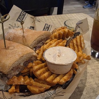 Park Tavern Bowling & Entertainment - Cubano Sandwich with Waffle Fries upgrade and Seasoned Sour Cream on the side.  Bloody Mary and chaser in the background. - Bowling Near Me - Saint Louis Park, Minnesota