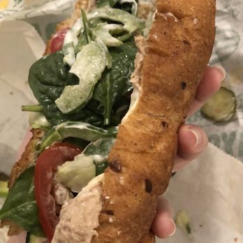 Subway - a person holding a sandwich in their hand - Sandwiches Near Me - Cypress, Texas