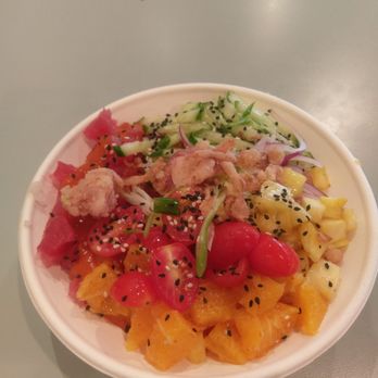 Miko Poke - Regular Ahi tuna Poke with grilled pineapple, chile oranges, cucumber, crispy garlic, white rice, shaved red onion, and carrot habanero aoli - Poke Near Me - Madison, Wisconsin