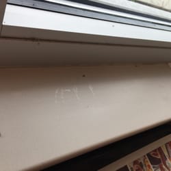 Dead gnats and trash on window ceils. Dirty tables