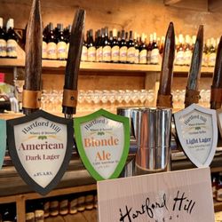 Hartford Hill Winery - House craft beers on tap.