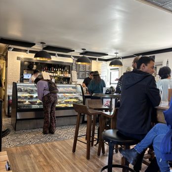 Mille - Looking toward the incredible desert case! So good! - French Near Me - Santa Fe, New Mexico