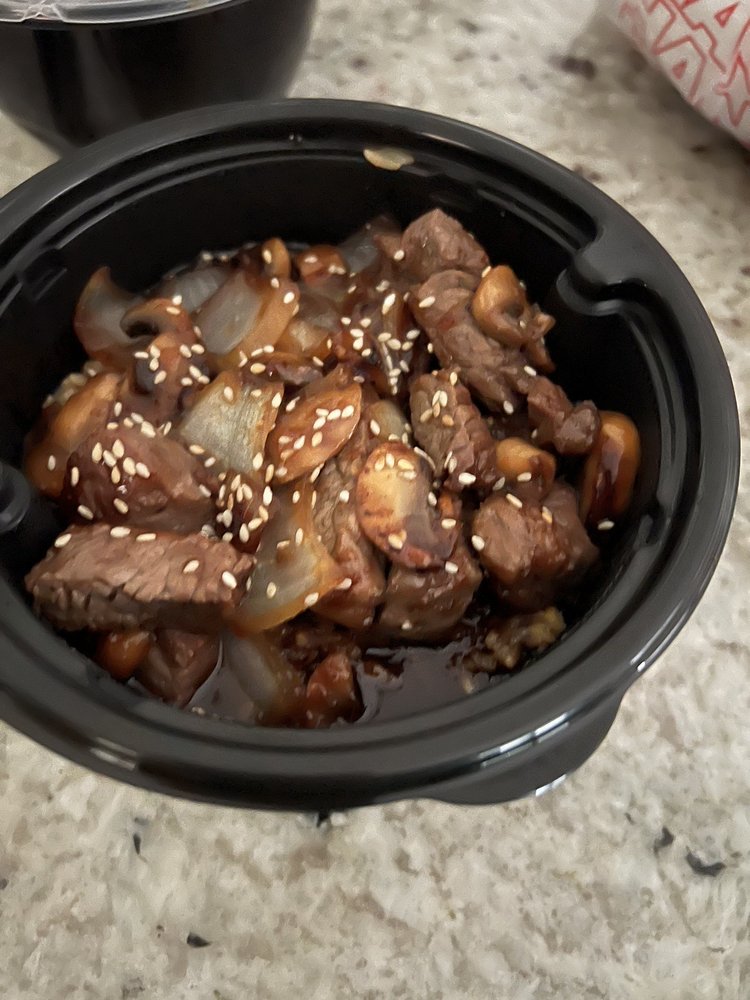 Beef Bulgogi served with Yum Yum roll, a customer favorite in Louisville.