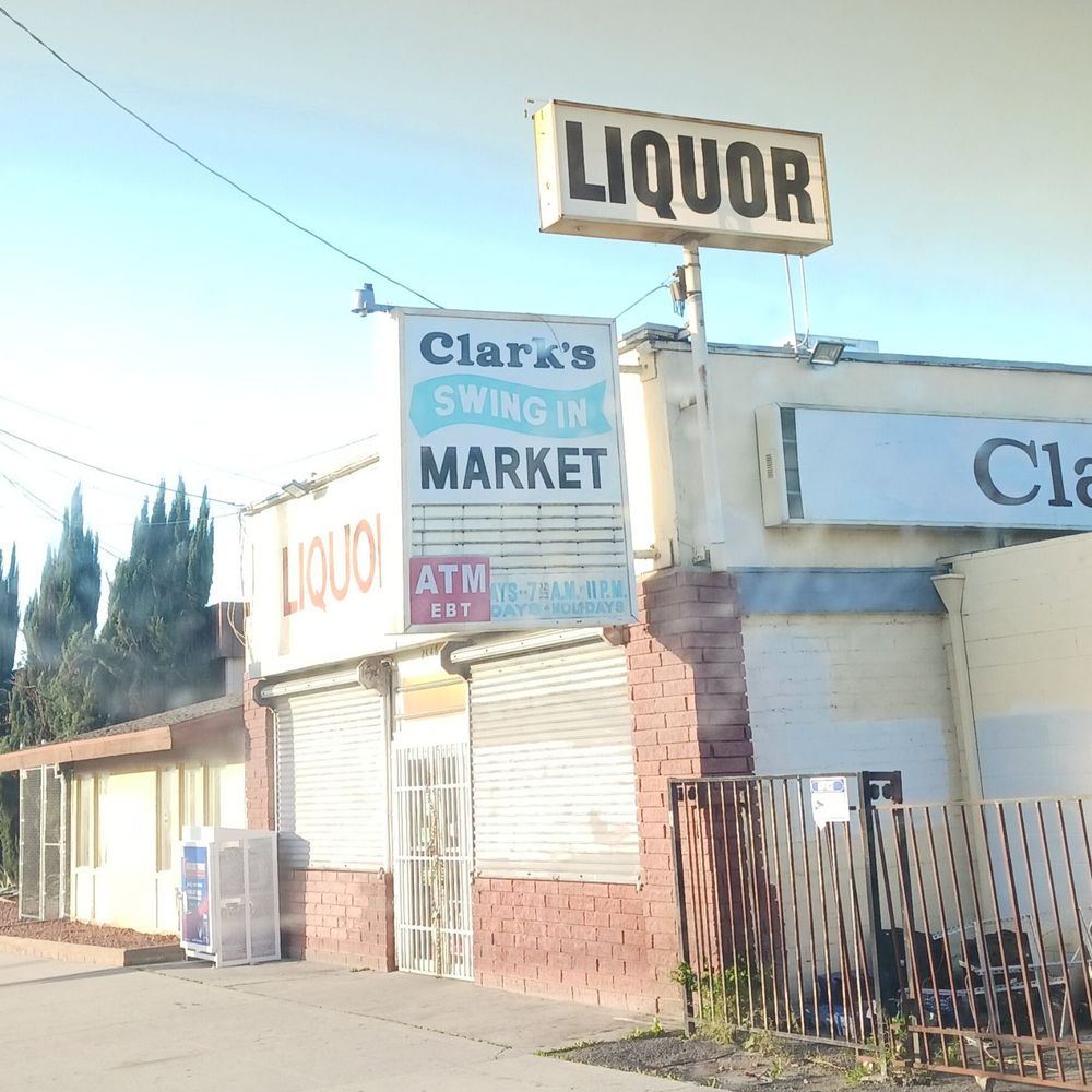 Clarks Liquor Store - a sign for clark's swingin'market - Beer, Wine & Spirits Near Me - San Bernardino, California