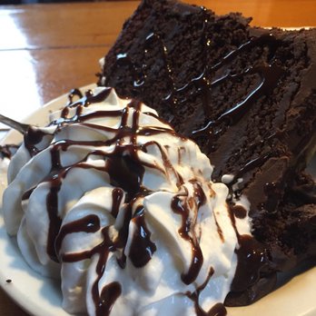 Warren House Pub - Triple chocolate fudge cake. - American Near Me - Cannon Beach, Oregon Warren House Pub - Triple chocolate fudge cake. - American Near Me - Cannon Beach, Oregon
