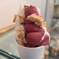 Lunada Creamery - Açaí/Vanilla, and Cake Batter/Reeces Pieces. Cookie dough on top.