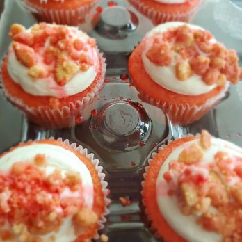 Poe's Kitchen - a tray of cupcakes with frosting and toppings - Soul Food Near Me - Bridgeport, Connecticut Poe's Kitchen - a tray of cupcakes with frosting and toppings - Soul Food Near Me - Bridgeport, Connecticut