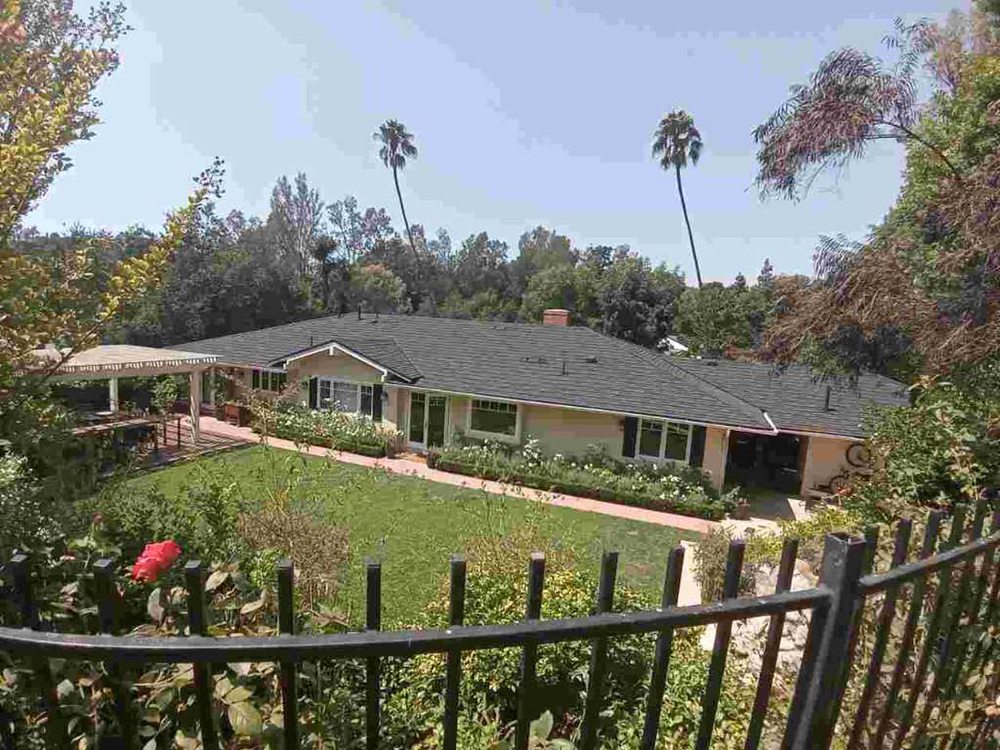 Slide of Reno's Roofing