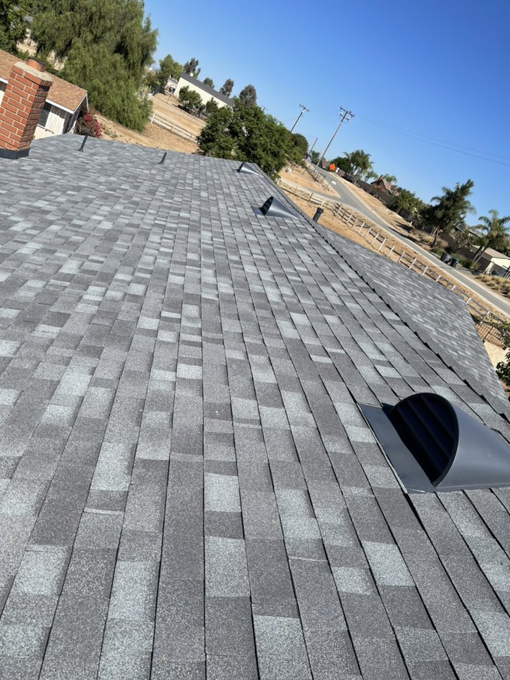 Slide of Manna Roofing Company