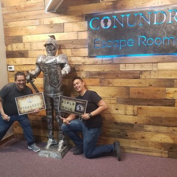 Conundrum Escape Rooms - Two players that are excited after having just completed Path of the Gods. - Escape Games Near Me - Arvada, Colorado Conundrum Escape Rooms - Two players that are excited after having just completed Path of the Gods. - Escape Games Near Me - Arvada, Colorado
