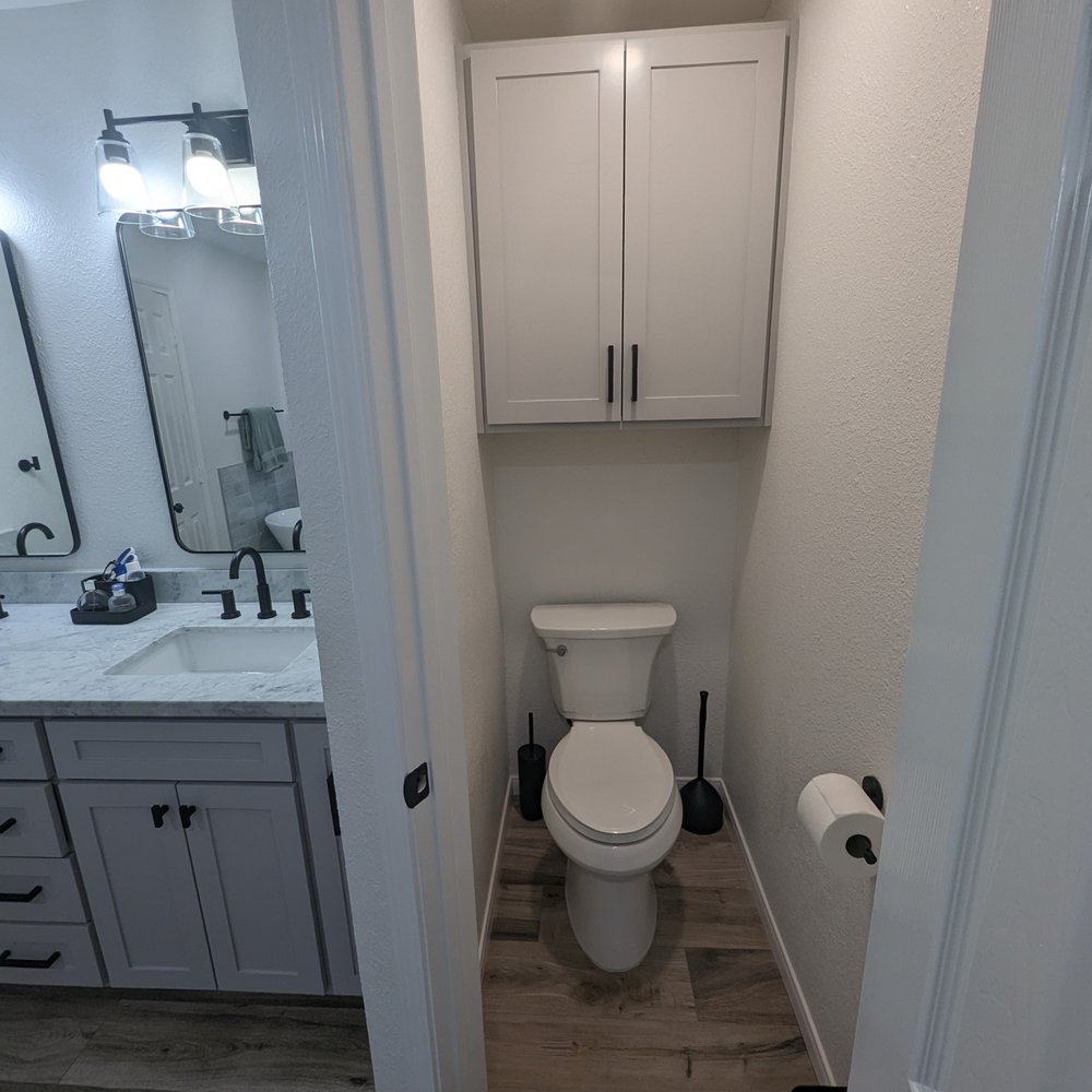 MKZ Construction - a bathroom with a toilet and sink - General Contractors Near Me - Conroe, Texas MKZ Construction - a bathroom with a toilet and sink - General Contractors Near Me - Conroe, Texas