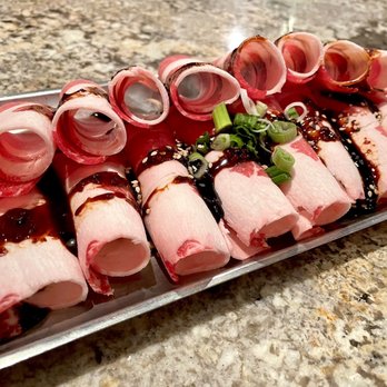 Blue House - Garlic soy beef belly ready to be grilled! - Korean Near Me - Sacramento, California