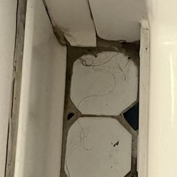 Floor between shower and vanity. I do not have black hair. Floor between shower and vanity. I do not have black hair.