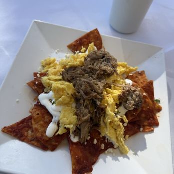 1906 - Red sauce chilaquiles with scrambled eggs and carnitas - American Near Me - Upland, California 1906 - Red sauce chilaquiles with scrambled eggs and carnitas - American Near Me - Upland, California