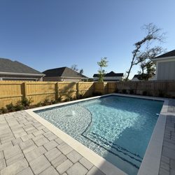 Blue Haven Pools & Spas - Pool with sun shelf and decking
