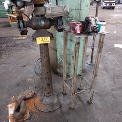 Jordan's Fish & Chicken - Thompson - A metal Grinder on a Pedestal Base