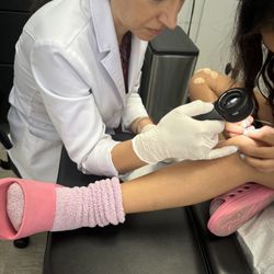 Sharona Yashar, MD - She is teaching my daughter about molluscom to calm my daughters nerves