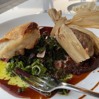 Celilo Restaurant & Bar - Chicken tamale dinner with Swiss chard and mole sauce. - New American Near Me - Hood River, Oregon Celilo Restaurant & Bar - Chicken tamale dinner with Swiss chard and mole sauce. - New American Near Me - Hood River, Oregon