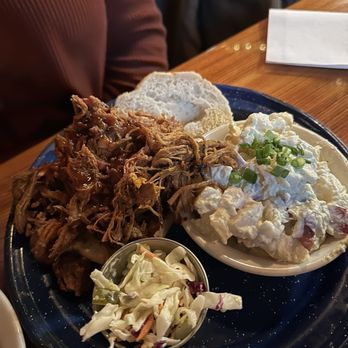 The Desoto Grill - Pulled Pork Sandwich on GF bun, side of Potato Salad & coleslaw - Barbeque Near Me - Kalispell, Montana The Desoto Grill - Pulled Pork Sandwich on GF bun, side of Potato Salad & coleslaw - Barbeque Near Me - Kalispell, Montana