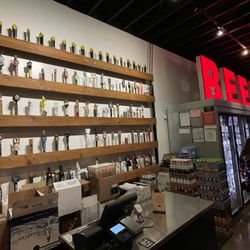 The Cellar Bottle Shop - Lots of beer taps on display.