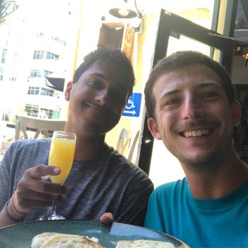 Rusticucina - My buddy and I enjoying some muffins and mimosas at the RustiCucina. - Italian Near Me - San Diego, California Rusticucina - My buddy and I enjoying some muffins and mimosas at the RustiCucina. - Italian Near Me - San Diego, California