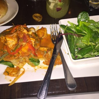 Havana Cafe - Pargo: red snapper, stewed tomatoes, olives, crispy yuca mofongo - Cuban Near Me - Bronx, New York Havana Cafe - Pargo: red snapper, stewed tomatoes, olives, crispy yuca mofongo - Cuban Near Me - Bronx, New York