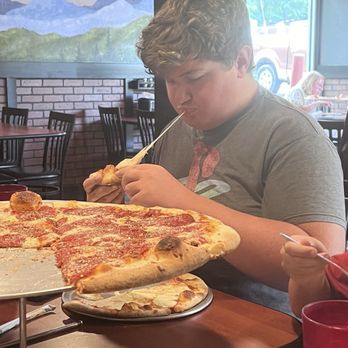 The Valley Pizzeria - Check out that cheese pull - Sandwiches Near Me - Canton, North Carolina The Valley Pizzeria - Check out that cheese pull - Sandwiches Near Me - Canton, North Carolina