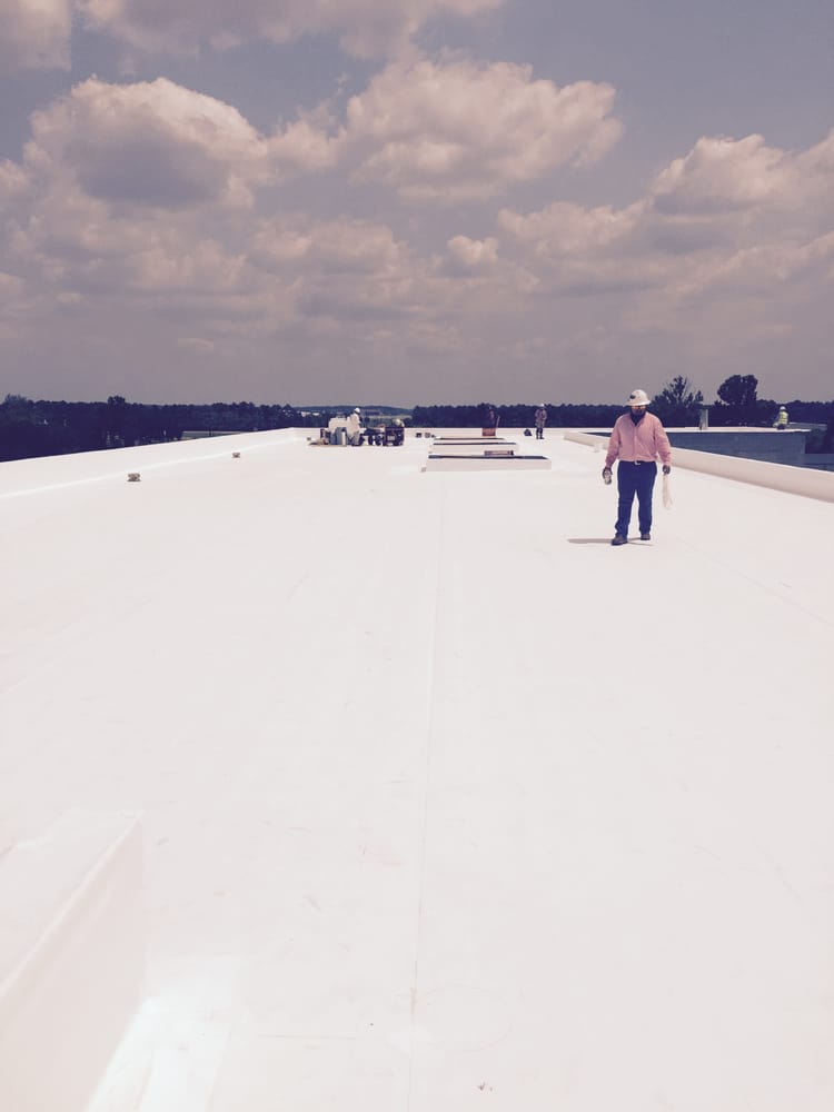 Slide of Longhorn Commercial Roofing