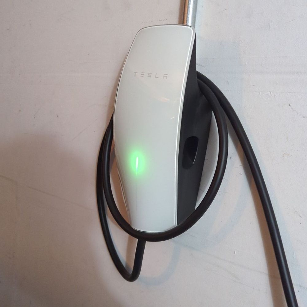 K Wise - Installed our Tesla wall charger quick and safely. Did clean our garage afterwards. Would recommend him for sure. - Electricians Near Me