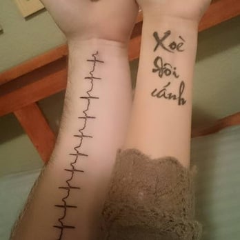 Jackalope Tattoo - EKG and a lyric from a popular Vietnamese children's song as an homage to my grandmother. - Tattoo Near Me - Minneapolis, Minnesota