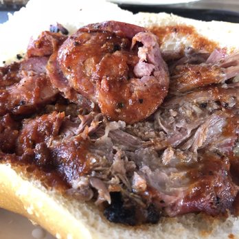 Goode Company Barbeque - Closeup of Combo Po-Boy: brisket and jalapeño sausage - Barbeque Near Me - Houston, Texas Goode Company Barbeque - Closeup of Combo Po-Boy: brisket and jalapeño sausage - Barbeque Near Me - Houston, Texas