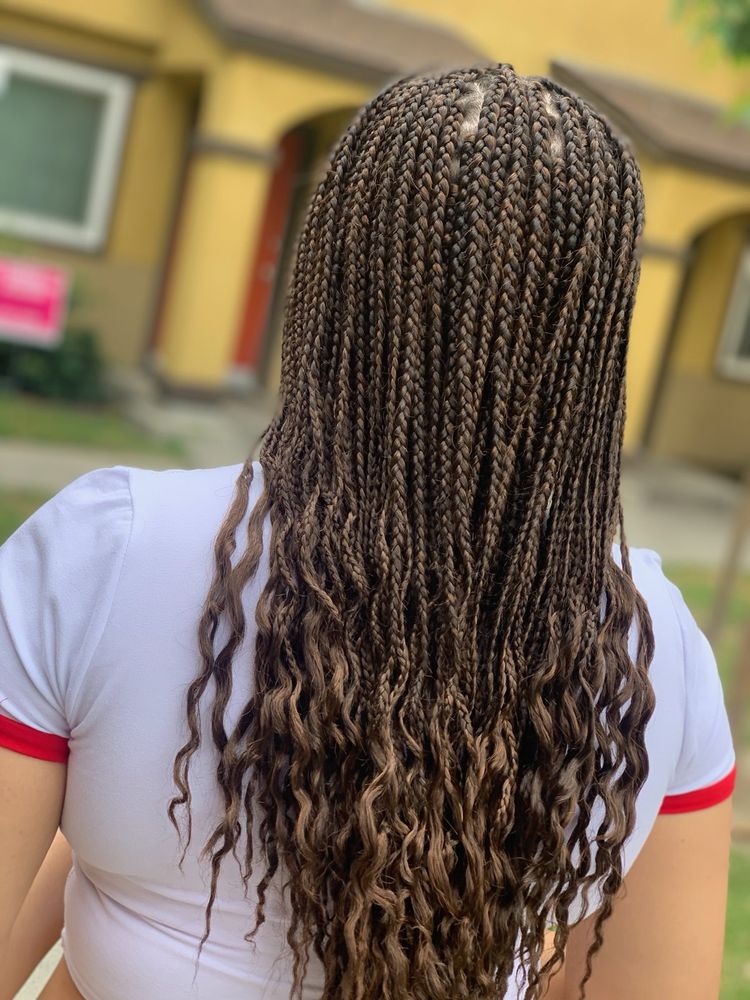 Braids By Jackie John Logo