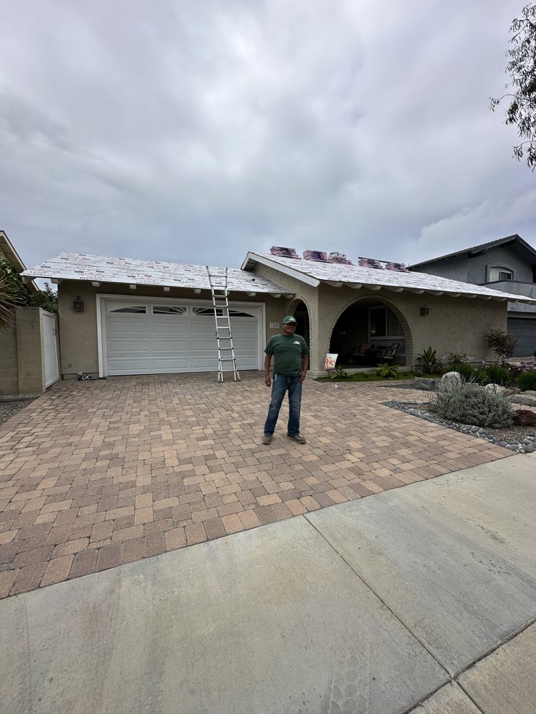 Slide of Reliance Roofing