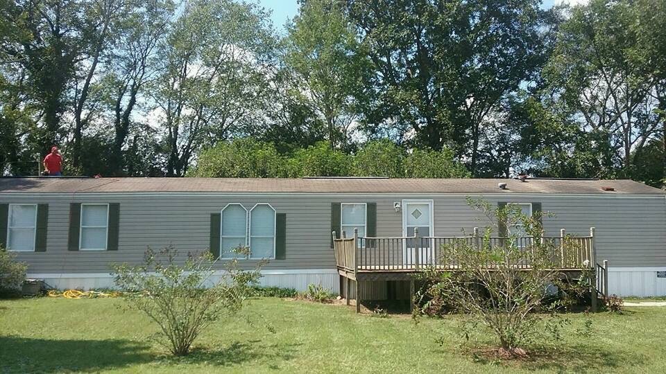 Slide of Burkett Brothers Metal Roofing