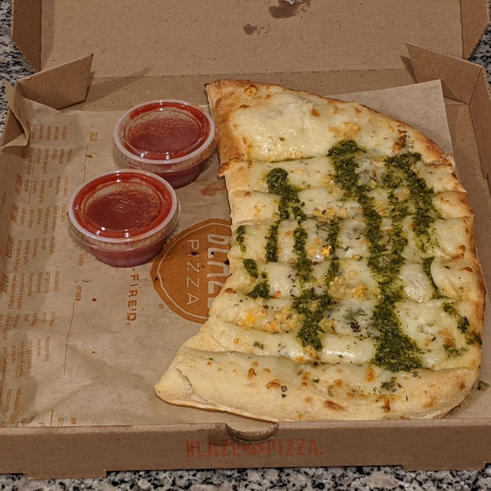 Blaze Pizza - Garlic Pesto Cheesy Bread with red sauce and spicy red sauce - Salad Near Me - Cerritos, California Blaze Pizza - Garlic Pesto Cheesy Bread with red sauce and spicy red sauce - Salad Near Me - Cerritos, California