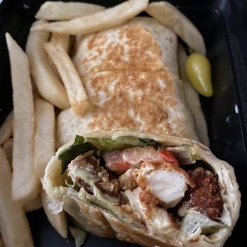 Secret Shawarma - Inside of the Chicken Cream Chop. - Mediterranean Near Me - San Diego, California Secret Shawarma - Inside of the Chicken Cream Chop. - Mediterranean Near Me - San Diego, California