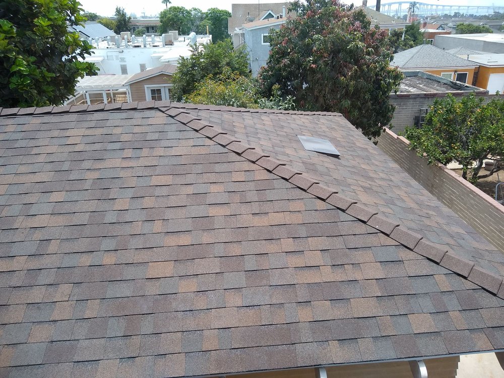 Slide of Dennis Cook Roofing