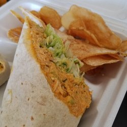 The Daily Grind Cafe & Deli - Buffalo chicken salad wrap and potato chips