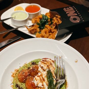 One Steakhouse - Heirloom Tomato salad and Calamari - Steakhouses Near Me - Las Vegas, Nevada One Steakhouse - Heirloom Tomato salad and Calamari - Steakhouses Near Me - Las Vegas, Nevada