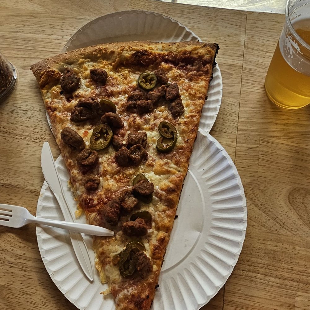 Benny Ernesto's - Spicy Sausage pizza slice - Pizza Near Me - Moncks Corner, South Carolina Benny Ernesto's - Spicy Sausage pizza slice - Pizza Near Me - Moncks Corner, South Carolina