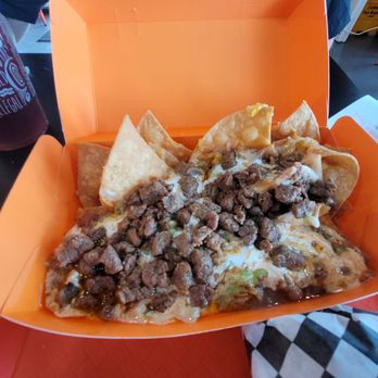 Roll Em Up Taquitos - Carne asada nachos - Mexican Near Me - Houston, Texas