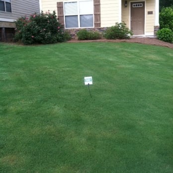 Southern Lawns - a lawn with a lawn sign in front of a house - Lawn Services Near Me - Auburn, Alabama Southern Lawns - a lawn with a lawn sign in front of a house - Lawn Services Near Me - Auburn, Alabama