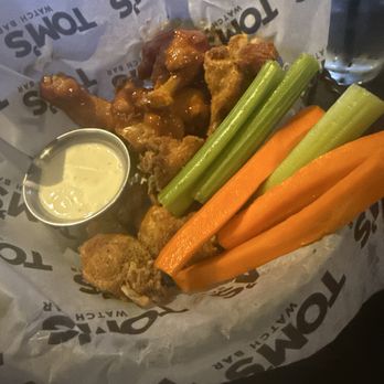 Tom's Watch Bar - Lemon pepper and mango habanero wings - New American Near Me - Las Vegas, Nevada Tom's Watch Bar - Lemon pepper and mango habanero wings - New American Near Me - Las Vegas, Nevada