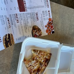 Antioch Pizza - Slice of thin crust pizza