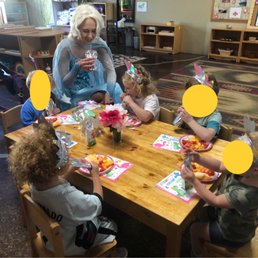 Elsa enjoyed cupcakes with the friends.
