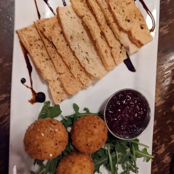 The Repp - Goat Cheese Fritters, The Repp's best appetizer. Perfect everytime and the flavors are so great. Don't forget to add the arugula! - New American Near Me - Snohomish, Washington