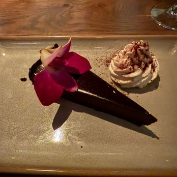 CARVE American Grille - Barton Creek - Gluten Free Flourless Fudgy Chocolate Cake - New American Near Me - Austin, Texas CARVE American Grille - Barton Creek - Gluten Free Flourless Fudgy Chocolate Cake - New American Near Me - Austin, Texas