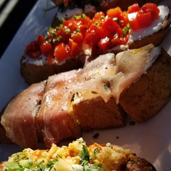 Postino Heights - Bruschetta: Prosciutto w/Figs & Mascarpone + Fresh Mozzarella w/Tomato & Basil - Wine Bars Near Me - Houston, Texas