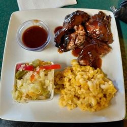 Caribbean Grill & Seafood Kitchen - Jerk, mac, and cabbage... with extra jerk sauce.